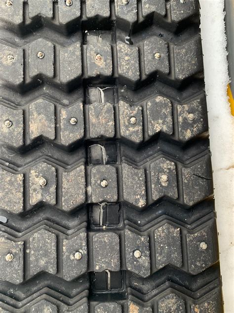 snow studs for skid steer tracks|grip studs for skid steer.